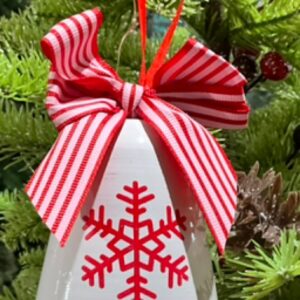 *White bell with red snowflake hanging decoration