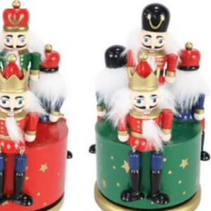 Nutcrackers on a music box, green base